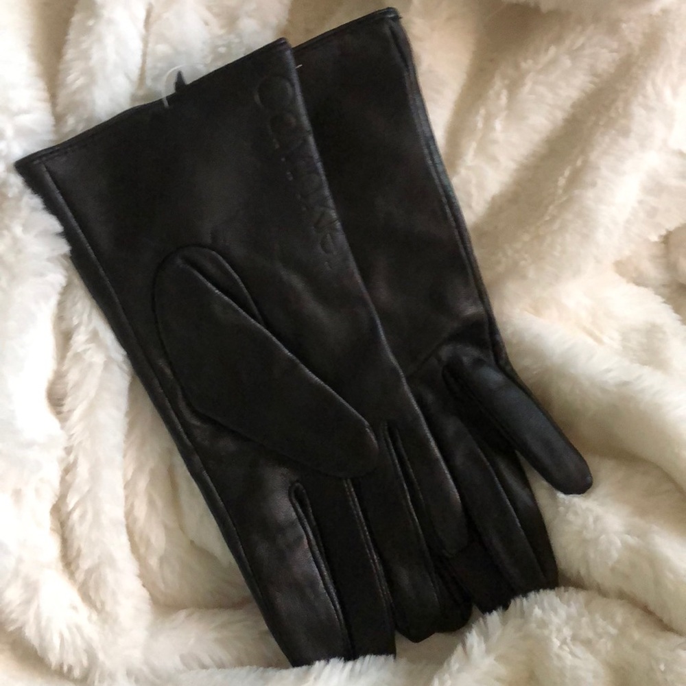 Brand new Calvin Klein leather gloves black